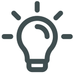 An icon of a light bulb with lines emanating from it, symbolizing an innovative idea in water treatment solutions. The bulb, colored in dark gray on a transparent background, captures the essence of brightness and ingenuity from a trusted supplier in the industry.
