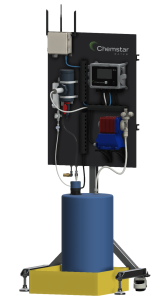 An industrial setup showcases a Chemstar control panel on a black board, accompanied by hoses, a pump, and a large blue drum on a yellow base. This chlorination skid is wired and tubed, suggesting intricate chemical processing capabilities.